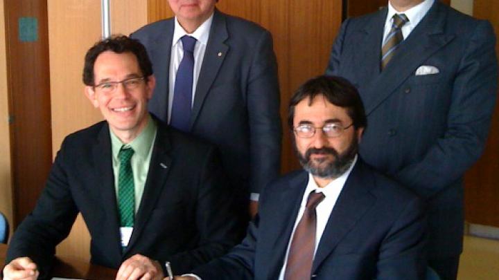 Seated from left: PI Director Neil Turok and ICTP Director Fernando Quevedo; Standing: Howard Alper, Chair/President, Science, Technology and Innovation Council Canada, and Ambassador Maurizio Serra, Permanent Delegation of Italy to UNESCO.